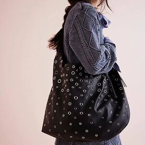 IN SEARCH OF!! Don’t buy!!! It’s the Embellished Slouchy carryall.